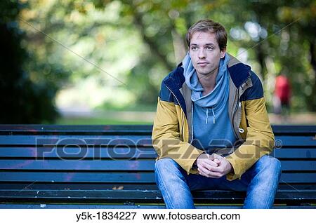 Amsterdam, Netherlands. Young man in his twenties, diagnosed with ADD or Attention Deficit Disorder. He works several jobs and considers to make a documentary with his journalist girlfriend. View Large Photo Image Stock Photo - Amsterdam, Netherlands. Young man in his twenties, diagnosed with ADD or Attention Deficit Disorder. He works several jobs and considers to make a documentary with his journalist girlfriend.. Fotosearch
