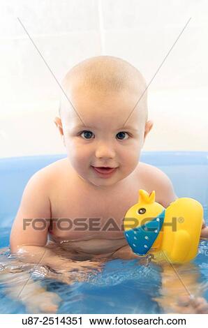 Baby Boy and Yellow Duck View Large Photo Image Stock Image - Baby Boy and Yellow Duck. Fotosearch