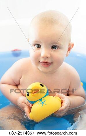 Baby Boy and Yellow Duck View Large Photo Image Stock Photo - Baby Boy and Yellow Duck. Fotosearch
