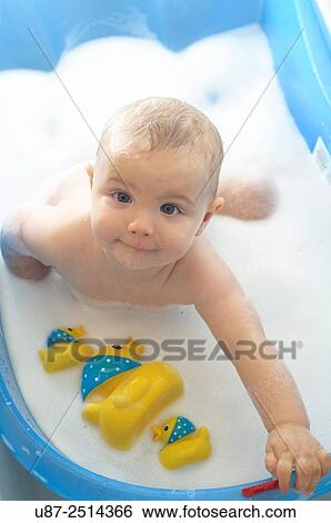 Baby Boy and Yellow Duck View Large Photo Image Stock Photograph - Baby Boy and Yellow Duck. Fotosearch