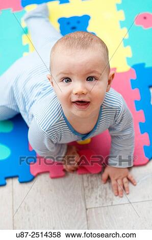 Baby Boy Looking at the Camera.. View Large Photo Image Stock Photo - Baby Boy Looking at the Camera... Fotosearch