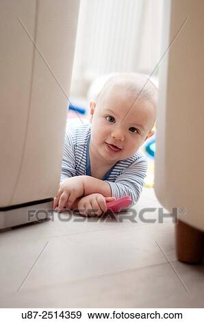 Baby Looking at the Camera.. View Large Photo Image Stock Photo - Baby Looking at the Camera... Fotosearch