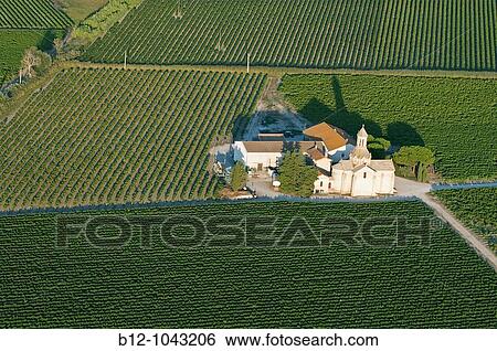 Church and vineyard, Montcalm, Camargue, Gard, Languedoc-Roussillon, France View Large Photo Image Stock Photograph - Church and vineyard, Montcalm, Camargue, Gard, Languedoc-Roussillon, France. Fotosearch