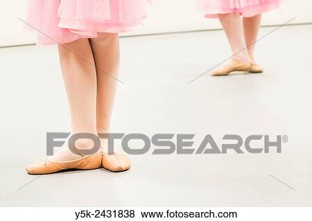 Stock Photo - Den Bosch, ´s-Hertogenbosch, Netherlands. Class of schoolgirls practising classical ballet at a local balletstudio.. Fotosearch