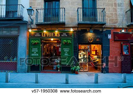 Stock Photo - Facade of La Perejila, typical tavern, night view. Cava Baja, Madrid, Spain.. Fotosearch