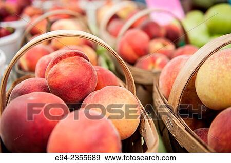 Fresh organic peaches on display at a farmer´s market. View Large Photo Image Stock Photo - Fresh organic peaches on display at a farmer´s market.. Fotosearch