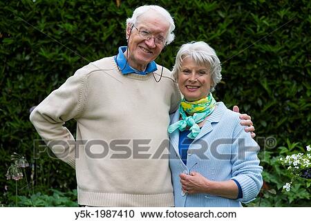 Hilligersberg, Rotterdam, Netherlands. Elder, married couple, still in love, together in their green garden. View Large Photo Image Stock Image - Hilligersberg, Rotterdam, Netherlands. Elder, married couple, still in love, together in their green garden.. Fotosearch