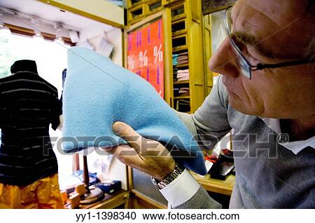 Stock Image - Owner of store for men´s fashion.. Fotosearch