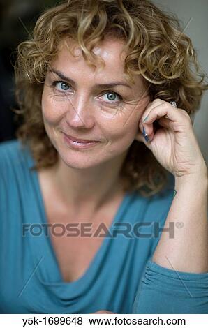 Portrait of a middle-aged blonde woman. View Large Photo Image Stock Photo - Portrait of a middle-aged blonde woman.. Fotosearch