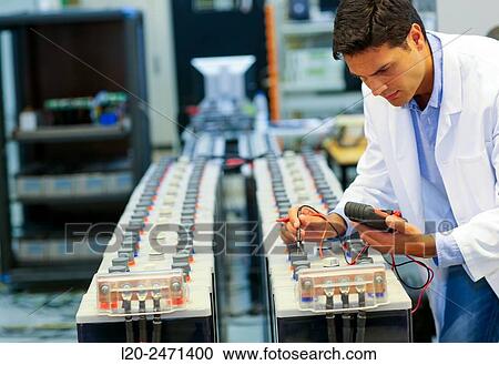 Stock Image - Researcher. Classic Solar Batteries. Solar Liquid Cell. Technological research on energy. Energy and Environment. Tecnalia Research & innovation, Bizkaia, Basque Country, Spain.. Fotosearch