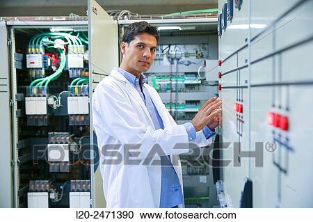 Stock Image - Researcher. Low Voltage Micro Network. Testing and Certificates Services for Smart Grids and Smart meters. Certification of Power Electronics Equipment. Technological Services to Industry. Tecnalia Research & innovation, Bizkaia, Basque Country, Spain.. Fotosearch