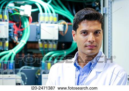 Stock Photo - Researcher. Low Voltage Micro Network. Testing and Certificates Services for Smart Grids and Smart meters. Certification of Power Electronics Equipment. Technological Services to Industry. Tecnalia Research & innovation, Bizkaia, Basque Country, Spain.. Fotosearch