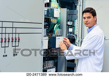 Stock Photo - Researcher. Low Voltage Micro Network. Testing and Certificates Services for Smart Grids and Smart meters. Certification of Power Electronics Equipment. Technological Services to Industry. Tecnalia Research & innovation, Bizkaia, Basque Country, Spain.. Fotosearch