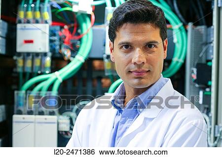 Stock Photograph - Researcher. Low Voltage Micro Network. Testing and Certificates Services for Smart Grids and Smart meters. Certification of Power Electronics Equipment. Technological Services to Industry. Tecnalia Research & innovation, Bizkaia, Basque Country, Spain.. Fotosearch