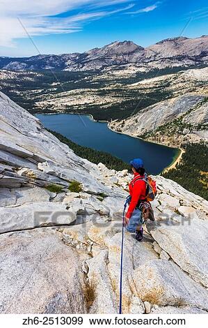Rock climber on Tenaya Peak, Tuolumne Meadows, Yosemite National Park, California USA. View Large Photo Image Stock Photo - Rock climber on Tenaya Peak, Tuolumne Meadows, Yosemite National Park, California USA.. Fotosearch
