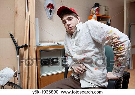 Rotterdam, Netherlands. Artist-painter, having a break in the office near his studio. View Large Photo Image Stock Image - Rotterdam, Netherlands. Artist-painter, having a break in the office near his studio.. Fotosearch