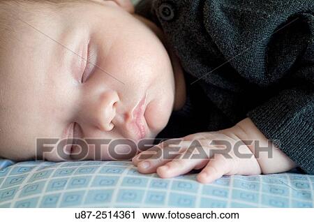 Stock Image - Sleeping Baby Boy.... Fotosearch