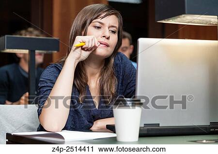 Student working in library View Large Photo Image Stock Image - Student working in library. Fotosearch