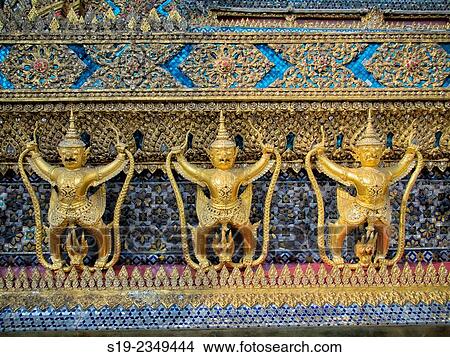 Thailand, Bangkok, Imperial Palace, View of gold colored figurines View Large Photo Image Picture - Thailand, Bangkok, Imperial Palace, View of gold colored figurines. Fotosearch
