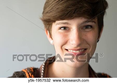 Tilburg, Netherlands. Studio-portrait of a young brunette Philosophy student at Tilburg University. View Large Photo Image Stock Image - Tilburg, Netherlands. Studio-portrait of a young brunette Philosophy student at Tilburg University.. Fotosearch