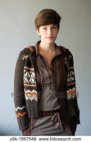 Tilburg, Netherlands. Studio-portrait of a young brunette Philosophy student at Tilburg University, waist-up. View Large Photo Image Stock Photo - Tilburg, Netherlands. Studio-portrait of a young brunette Philosophy student at Tilburg University, waist-up.. Fotosearch