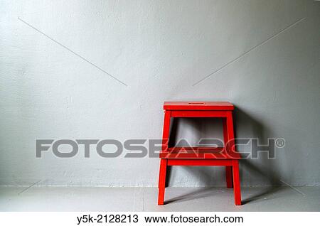 Tuinstraat, Tilburg, Netherlands. Small, red painted stool, bought at Ikea, parked against a grey photo-studio wall. View Large Photo Image Stock Image - Tuinstraat, Tilburg, Netherlands. Small, red painted stool, bought at Ikea, parked against a grey photo-studio wall.. Fotosearch