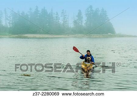 A lone kayaker in bad weather, Halifax, Nova Scotia, Canada View Large Photo Image Stock Photo - A lone kayaker in bad weather, Halifax, Nova Scotia, Canada. Fotosearch