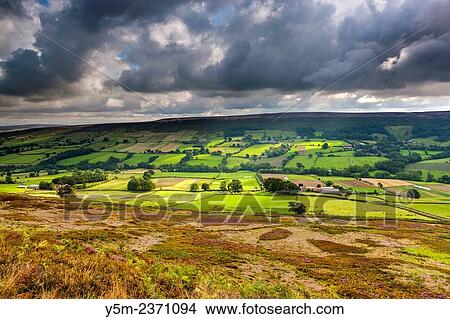 A view over moors near Castelton, North York Moors National Park, North Yorkshire, England, United Kingdom, Europe. View Large Photo Image Picture - A view over moors near Castelton, North York Moors National Park, North Yorkshire, England, United Kingdom, Europe.. Fotosearch