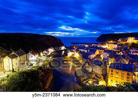 A view over the traditional fishing village of Staithes, North Yorkshire, England, United Kingdom, Europe. View Large Photo Image Picture - A view over the traditional fishing village of Staithes, North Yorkshire, England, United Kingdom, Europe.. Fotosearch
