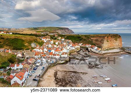A view over the traditional fishing village of Staithes, North Yorkshire, England, United Kingdom, Europe. View Large Photo Image Stock Photo - A view over the traditional fishing village of Staithes, North Yorkshire, England, United Kingdom, Europe.. Fotosearch