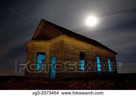 Picture - Abandoned Taiban Presbyterian Church in New Mexico at night with star trails.. Fotosearch