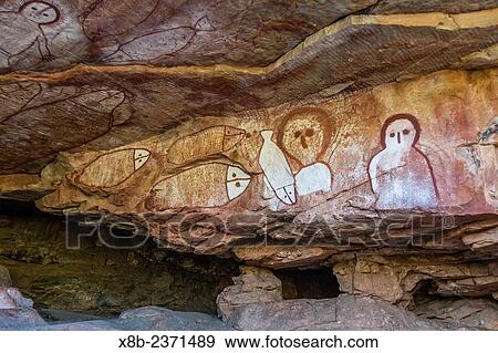 Aboriginal Wandjina cave artwork in sandstone caves at Raft Point, Kimberley, Western Australia, Australia. View Large Photo Image Stock Photo - Aboriginal Wandjina cave artwork in sandstone caves at Raft Point, Kimberley, Western Australia, Australia.. Fotosearch