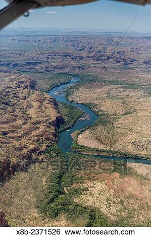 Stock Photograph - Aerial view of the manmade Ord River between Lake Kununurra and a Diversion Dam built in 1972, Kimberley, Western Australia, Australia.. Fotosearch