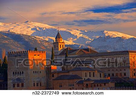 Alhambra, UNESCO World Heritage Site, Sierra Nevada and la Alhambra at Sunset, Granada, Andalusia, Spain. View Large Photo Image Stock Photo - Alhambra, UNESCO World Heritage Site, Sierra Nevada and la Alhambra at Sunset, Granada, Andalusia, Spain.. Fotosearch