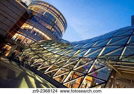 Angled view of the contemporary glass roof at night, Zlote Tarasy Shopping mall, modern architecture, Warsaw, Poland, Europe. View Large Photo Image Picture - Angled view of the contemporary glass roof at night, Zlote Tarasy Shopping mall, modern architecture, Warsaw, Poland, Europe.. Fotosearch