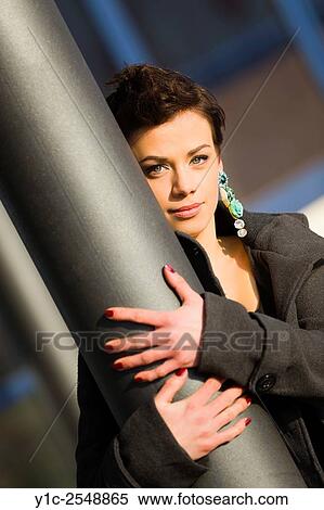 Stock Photography - Behind column portrait.. Fotosearch