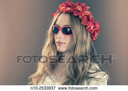 Blonde teenage girl wearing sunglasses. View Large Photo Image Stock Photo - Blonde teenage girl wearing sunglasses.. Fotosearch