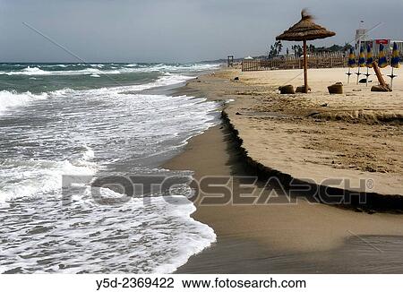 Calm beach in Catania, Sicily, Europe. View Large Photo Image Stock Image - Calm beach in Catania, Sicily, Europe.. Fotosearch