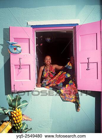 Caribbean, British Virgin Islands, Tortola, Road Town, woman looking out window. View Large Photo Image Stock Image - Caribbean, British Virgin Islands, Tortola, Road Town, woman looking out window.. Fotosearch