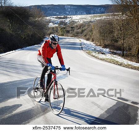 cyclist on a road. Lizarraga pass. Navarre, Spain. View Large Photo Image Stock Photography - cyclist on a road. Lizarraga pass. Navarre, Spain.. Fotosearch