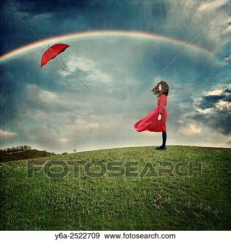 Dreamy image of young woman in red dress standing on hill. View Large Photo Image Stock Photo - Dreamy image of young woman in red dress standing on hill.. Fotosearch