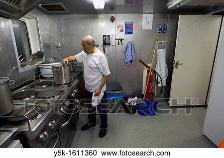 During the voyage of the MV Flintercape from Rotterdam, Netherlands to Sundsvall, Sweden, this Indonesian cook takes care of all the food and meals on board View Large Photo Image Stock Image - During the voyage of the MV Flintercape from Rotterdam, Netherlands to Sundsvall, Sweden, this Indonesian cook takes care of all the food and meals on board. Fotosearch