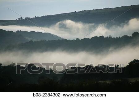 dusk landscape with mist, near Matlock, Derbyshire, Britain. View Large Photo Image Stock Image - dusk landscape with mist, near Matlock, Derbyshire, Britain.. Fotosearch