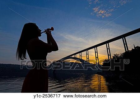 Dusk music trumpet and bridge. View Large Photo Image Stock Photo - Dusk music trumpet and bridge.. Fotosearch