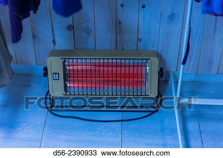 Stock Image - electric heater in a shop, Valencia, Spain.. Fotosearch