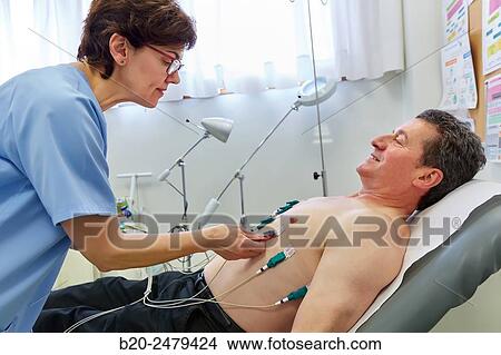 Electrocardiogram, Treatment room, Medical consultation, Ambulatory Lezo, Gipuzkoa, Basque Country, Spain View Large Photo Image Picture - Electrocardiogram, Treatment room, Medical consultation, Ambulatory Lezo, Gipuzkoa, Basque Country, Spain. Fotosearch