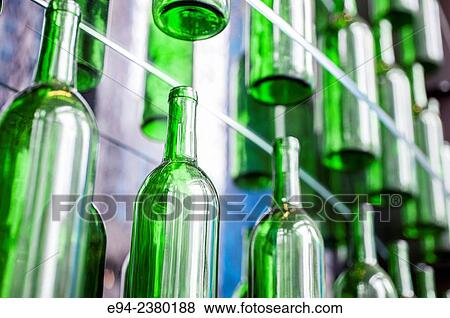 Empty green wine bottles on shelves in a bar. View Large Photo Image Stock Photo - Empty green wine bottles on shelves in a bar.. Fotosearch