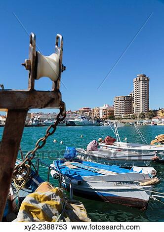 Fuengirola, Costa del Sol, Malaga Province, Andalusia, southern Spain. Boats in fishing harbour. View Large Photo Image Stock Image - Fuengirola, Costa del Sol, Malaga Province, Andalusia, southern Spain. Boats in fishing harbour.. Fotosearch
