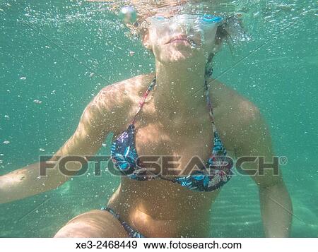 Girl underwater View Large Photo Image Stock Photo - Girl underwater. Fotosearch
