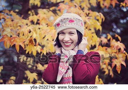 Happy mid adult woman, autumn View Large Photo Image Stock Photography - Happy mid adult woman, autumn. Fotosearch